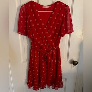 Francesca’s red polka dot dress